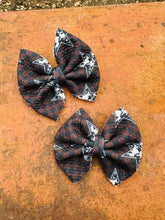 Load image into Gallery viewer, Cowprint stars baby bow piggy clips