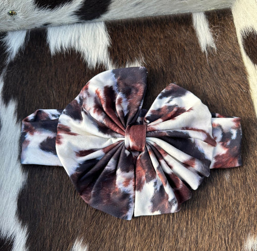 Brown and white cowprint baby bow