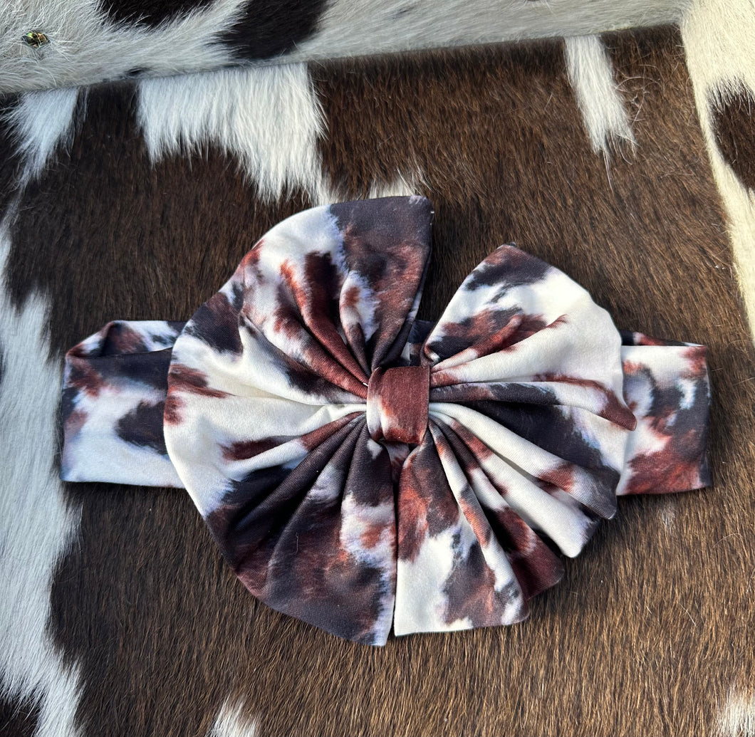 Brown and white cowprint baby bow