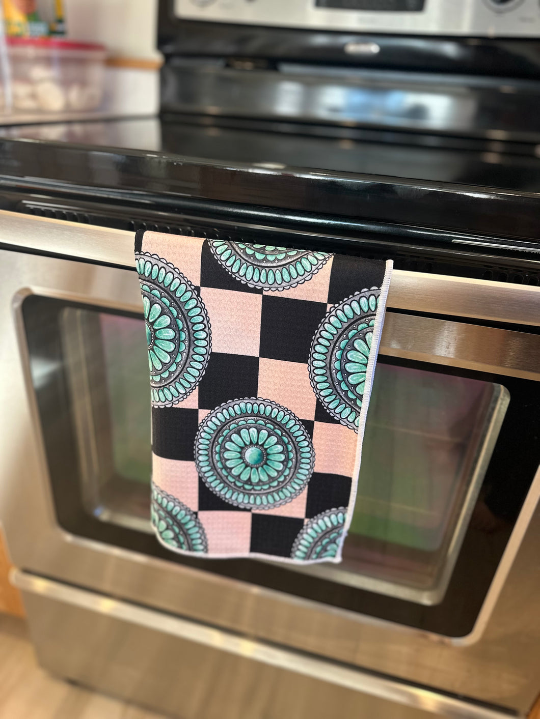 Checkered print concho hand towel