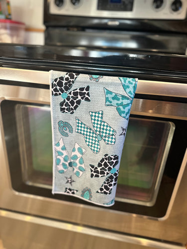 Turquoise bow hand towel