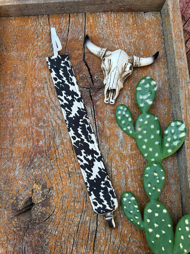 Black and white cowprint baby pacifier clip