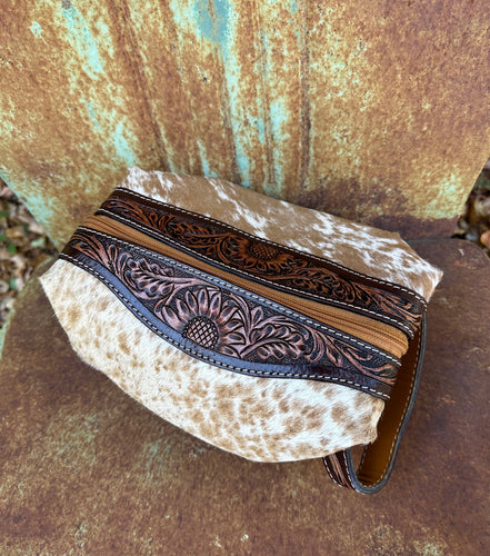 Brown and white speckled cowhide make up bag