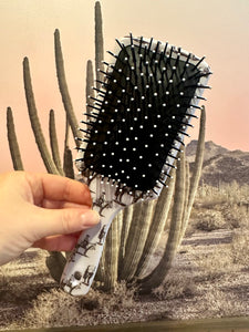 The lone cowboy hair brush