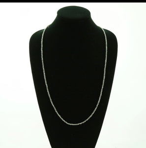 Long faux silver Navajo style necklace