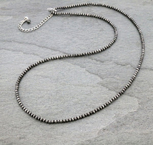 Long faux silver Navajo style necklace