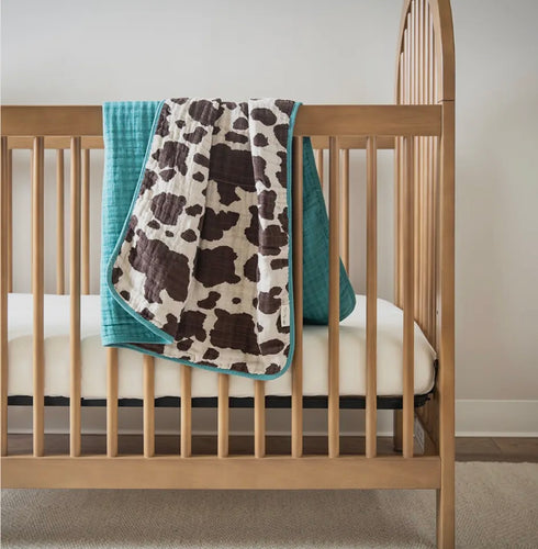 Cowprint / turquoise baby blanket