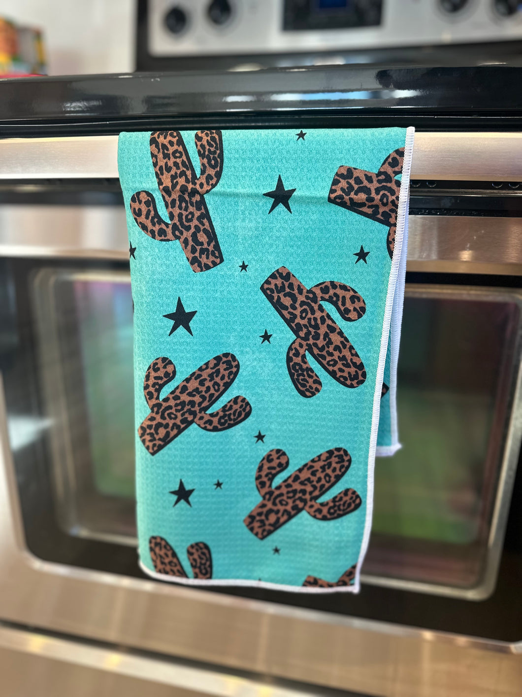 Turquoise cactus hand towel