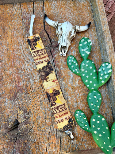 Cowboy baby pacifier clip