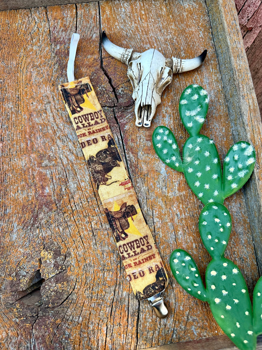 Cowboy baby pacifier clip