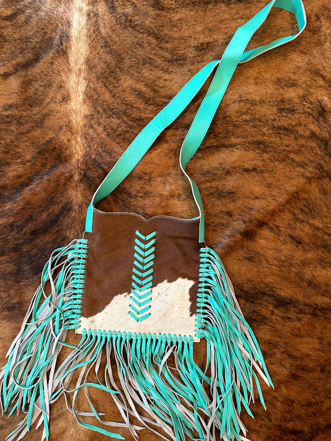 Turquoise cowhide cross body purse