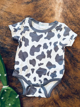 Load image into Gallery viewer, Cowprint baby onesie