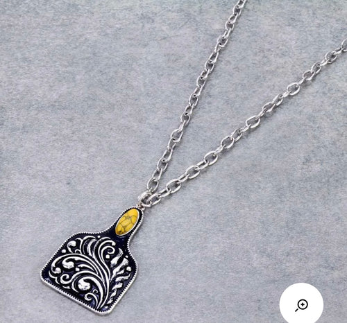 Yellow cattle tag necklace
