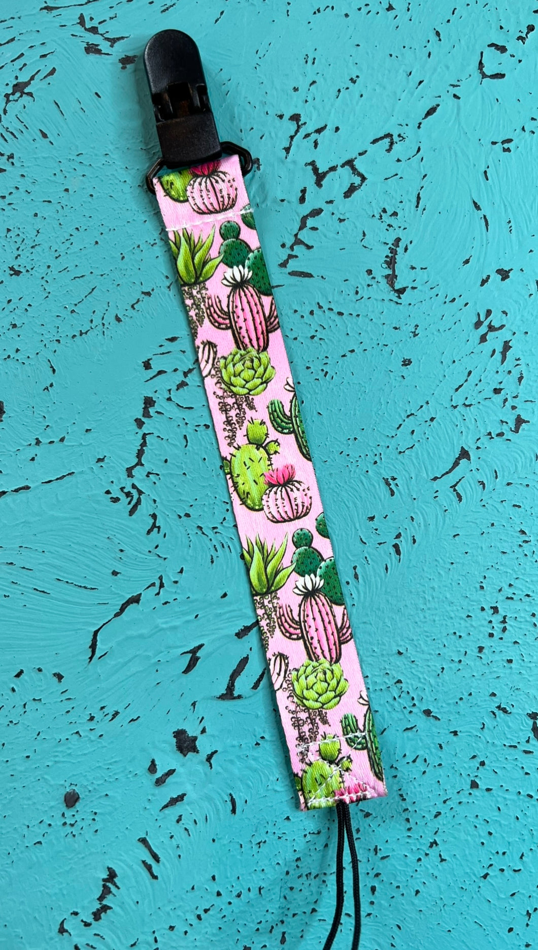 Pink cactus pacifier clip