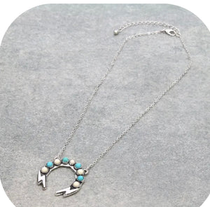 Turquoise and white bolt squash necklace