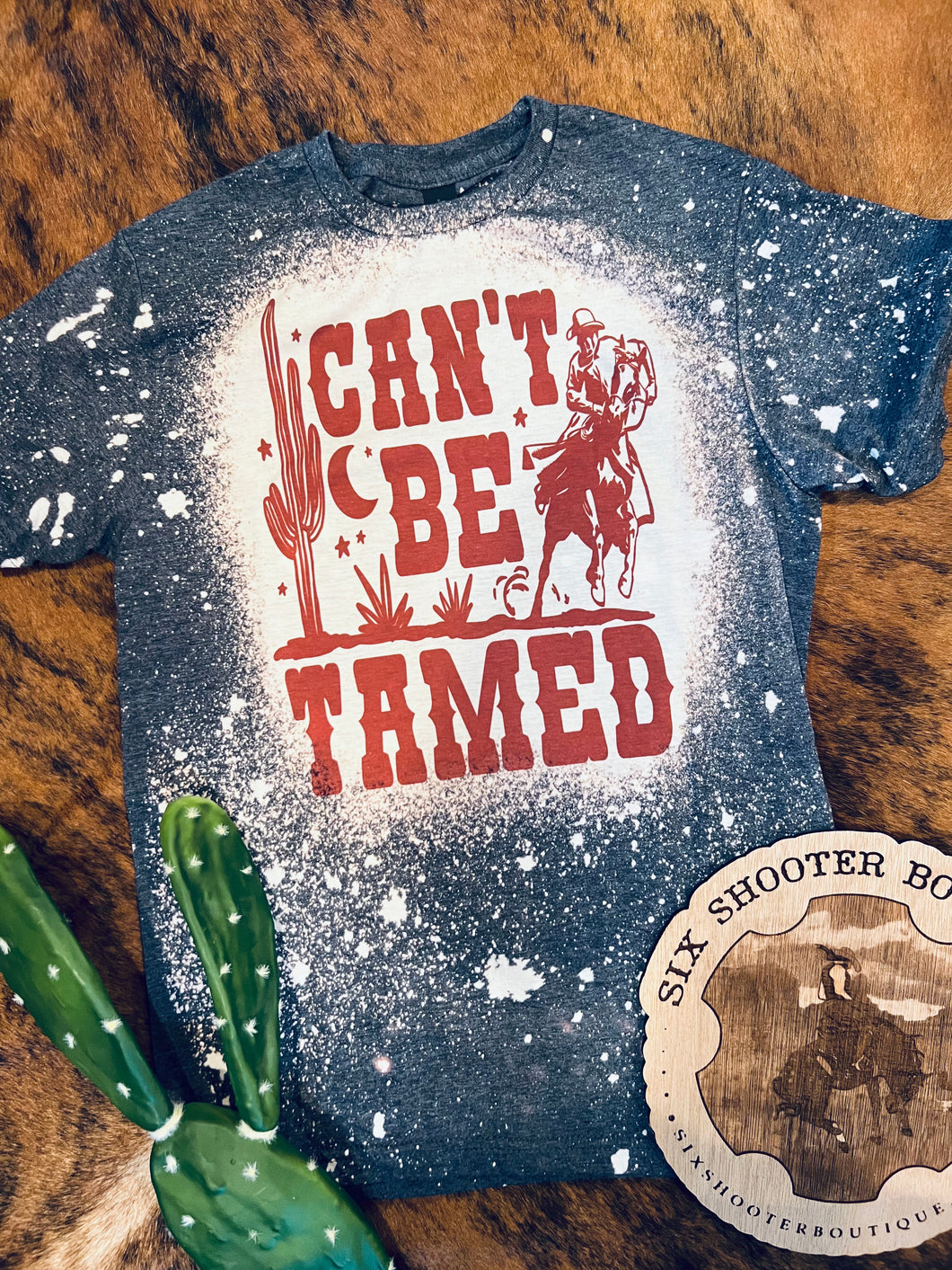 Can’t be tamed tee