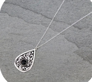 Black and silver pendant necklace