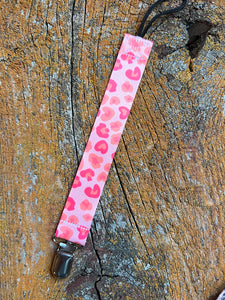 Pink cheetah pacifier clip